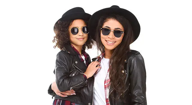 mom and daughter with sunglasses and black hats